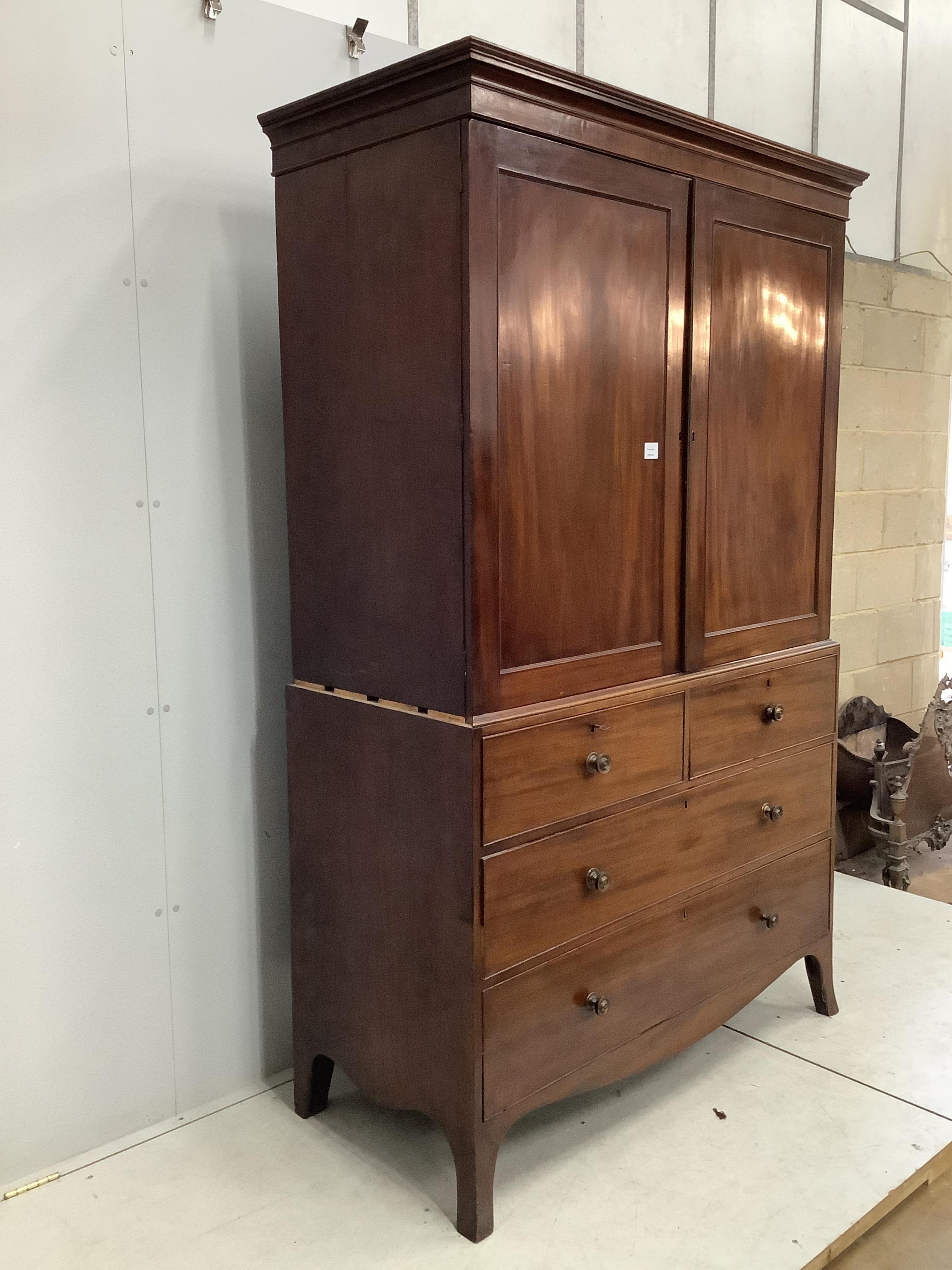 A George IV mahogany linen press, width 128cm, depth 58cm, height 208cm. Condition - fair, interior adapted